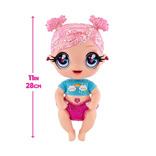 MGA Entertainment Glitter Babyz Muñeca Dreamia Stardust con 3 Cambios de Color mágicos, Pelo Rosa y Vestido arcoíris, Incluye pañal, biberón y Chupete Reutilizables, Edad: 3+ años