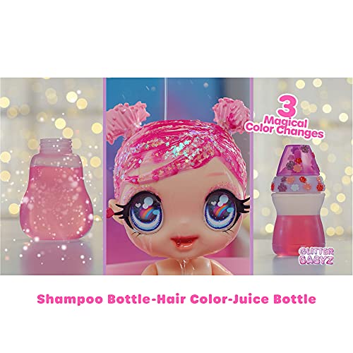 MGA Entertainment Glitter Babyz Muñeca Dreamia Stardust con 3 Cambios de Color mágicos, Pelo Rosa y Vestido arcoíris, Incluye pañal, biberón y Chupete Reutilizables, Edad: 3+ años