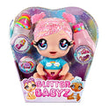 MGA Entertainment Glitter Babyz Muñeca Dreamia Stardust con 3 Cambios de Color mágicos, Pelo Rosa y Vestido arcoíris, Incluye pañal, biberón y Chupete Reutilizables, Edad: 3+ años